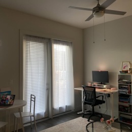 living room with ceiling fan