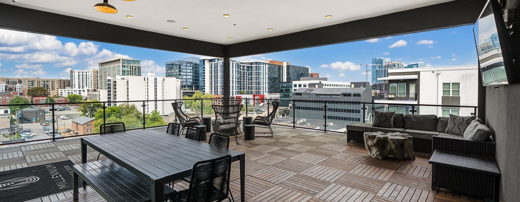 a table and chairs on a deck