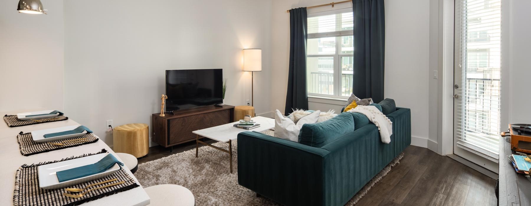 a living room with a couch and a tv